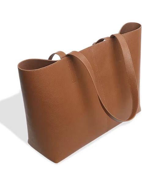 Brown leather tote bag on a white background
